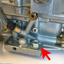 Nut, M8x1.25, 12mm across flats and washer holding carburettor to manifold.