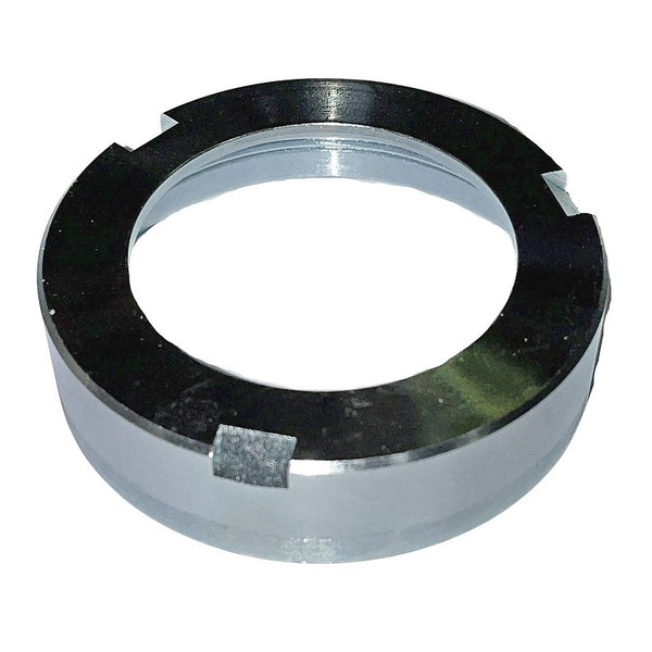 Retaining lock ring nut for gearbox output housing bearing and seal.
