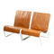 Tan brown, fairly hard flat vinyl, seat cover pads with fitted wires only for front of AZU or AK, price for one pair.